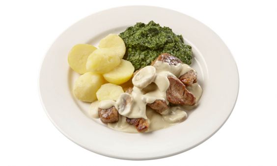 Standaard Varkenshaasstukjes in champignonsaus met spinazie à la crème en gekookte aardappelen